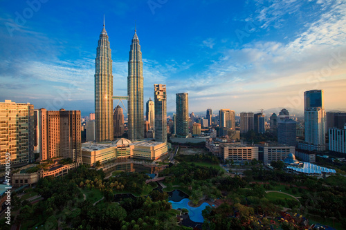Malaysia, Kuala Lumpur, KLCC Park and Petronas Towers at dusk