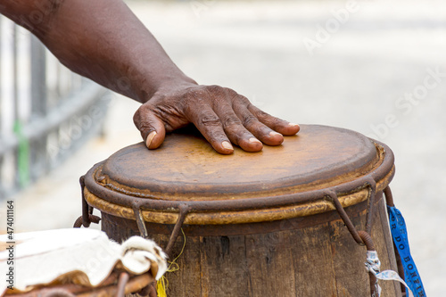 Fototapeta Percussionist playing a rudimentary atabaque during afro-brazilian capoeira figh