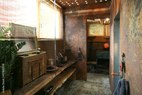 Bathroom with corten steel wall cladding photo