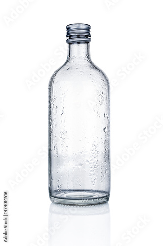 Empty  glass bottle close up isolated on white background