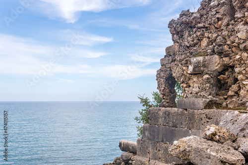 Mediterranean landscape with ruine of ancient builing on the seashore