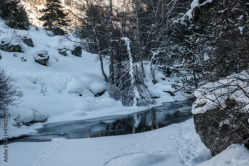 Frozen river in Andorra Pyrenees