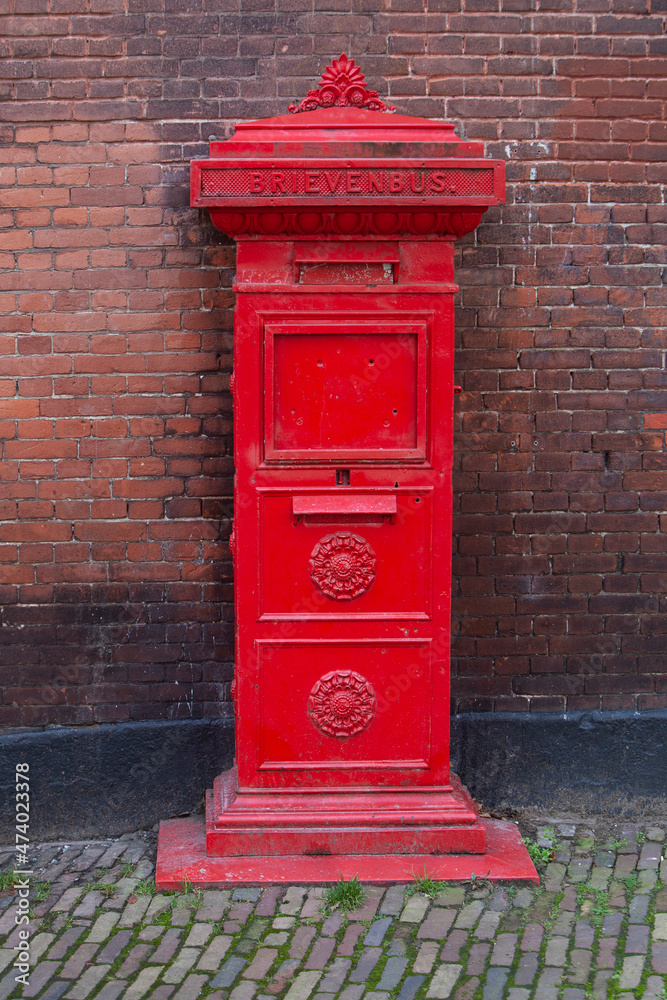 Classic red letterbox in the Netherlands