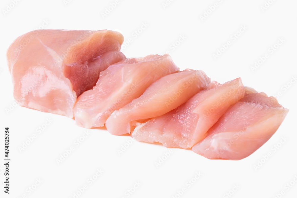Chicken fillet cut into slices isolated on a white background