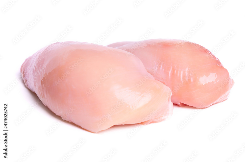 Two halves of chicken breast. Chicken fillet isolated on a white background Two halves of chicken breast. Chicken fillet isolated on a white background