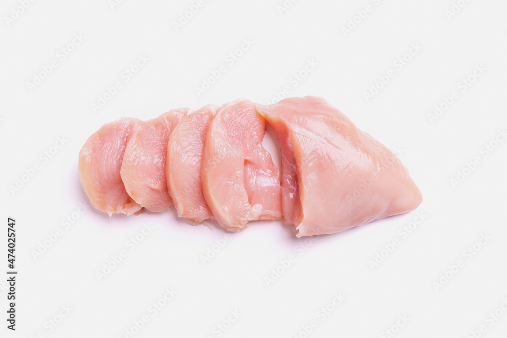 Raw chicken breast top view, chicken fillet cut into slices. isolated on a white background Raw chicken breast top view, chicken fillet cut into slices. isolated on a white background