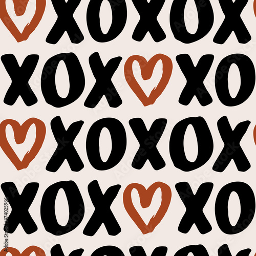 Hand drawn seamless vector pattern with xoxo lettering. Endless romantic background for Valentines Day, holidays and wedding design. Cute flat illustration. Love symbol. Boho female texture photo