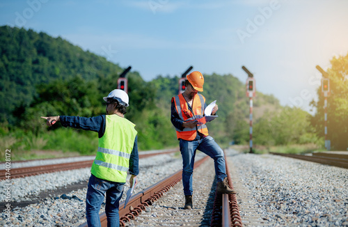 Train engineers are checking the operation.