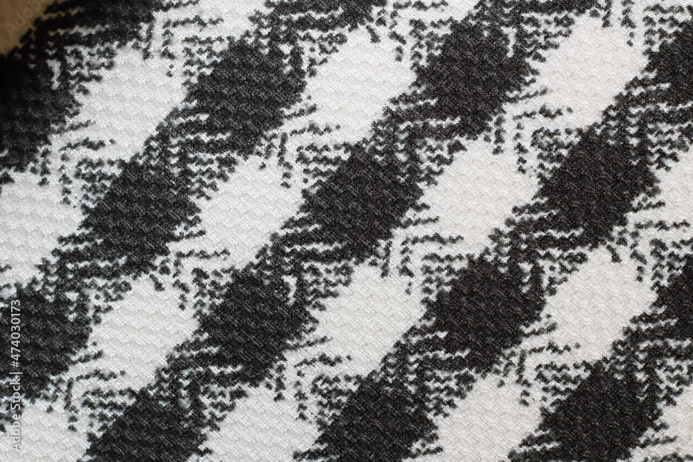 texture of black and white jacquard fabric with geometric pattern texture of black and white jacquard fabric with geometric pattern