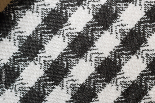 texture of black and white jacquard fabric with geometric pattern