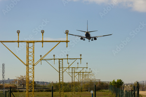 Beacons with lights, marking the entrance to the aircraft for landing on the airport runway.