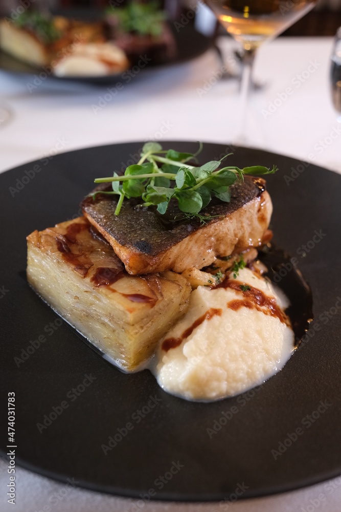 Pan seared halibut with condiments
a traditional dinner during christmas in Norway
