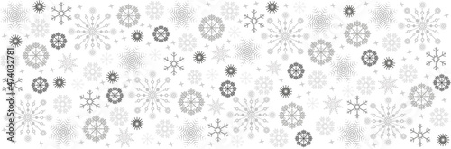 Illustration, viele verschiedene dekorative Schneeflocken in verschiedenen grau Farben, Graustufen. Banner © Sonja