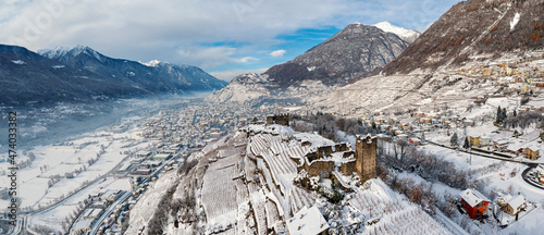 Castel Grumello and vineyards, near Sondrio in Valtellina, winter aerial view	 photo