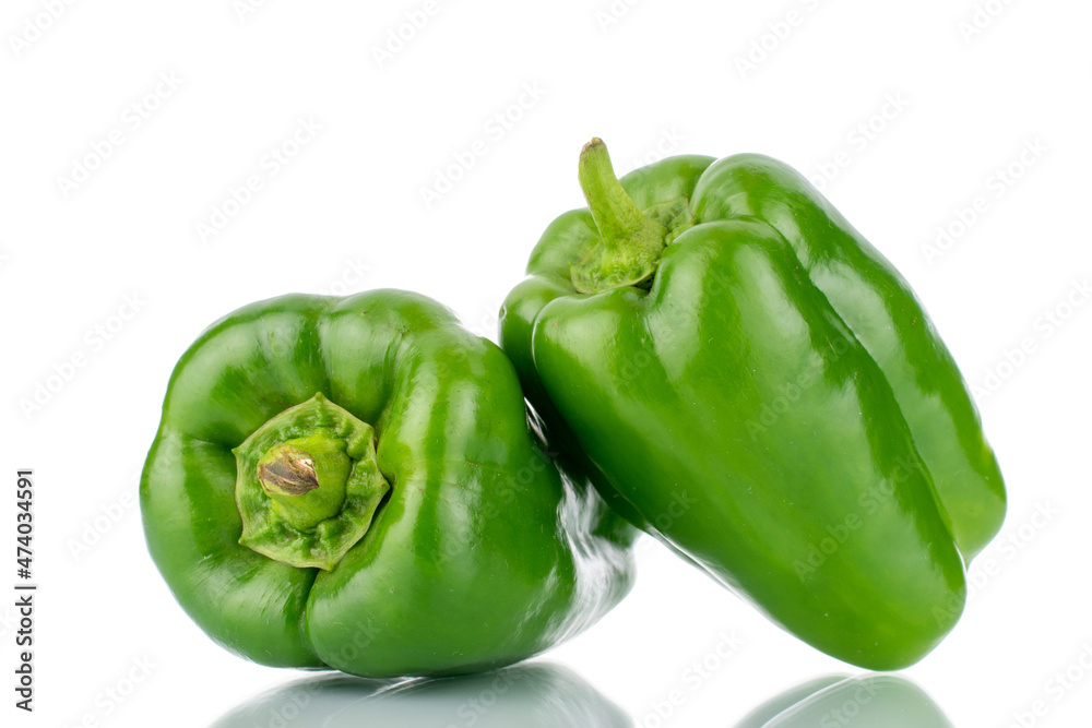 Two sweet green peppers, close-up, isolated on white. Two sweet green peppers, close-up, isolated on white.