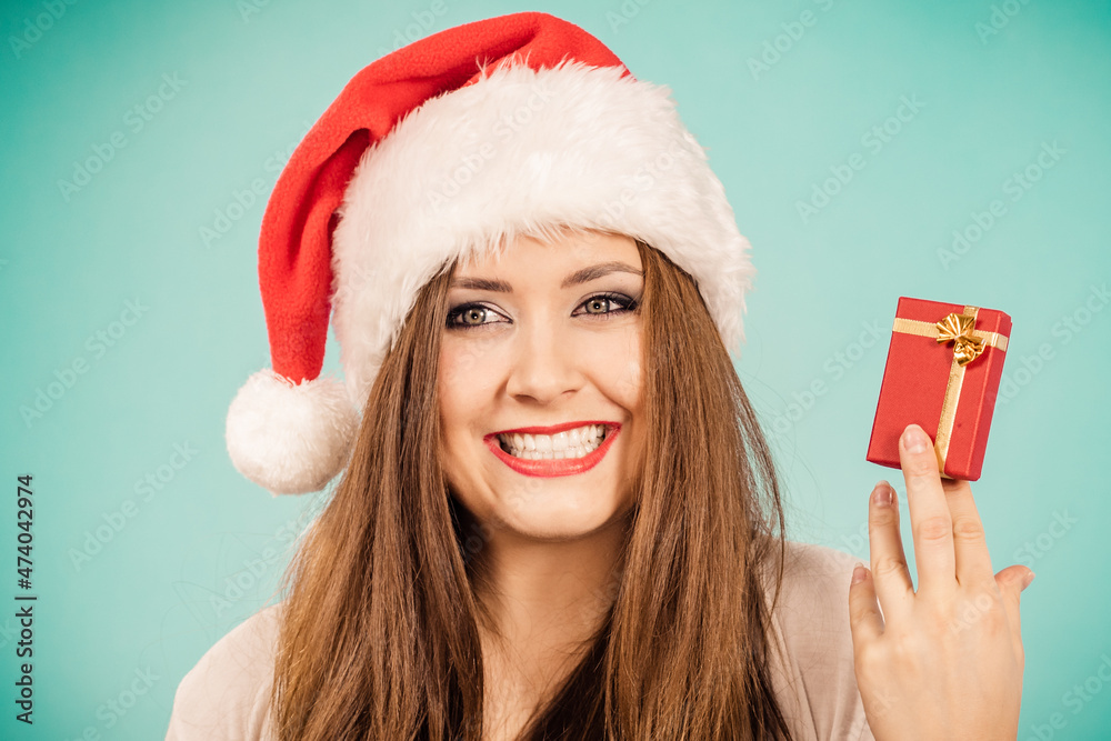 Woman holds gift box. Christmas time Woman holds gift box. Christmas time