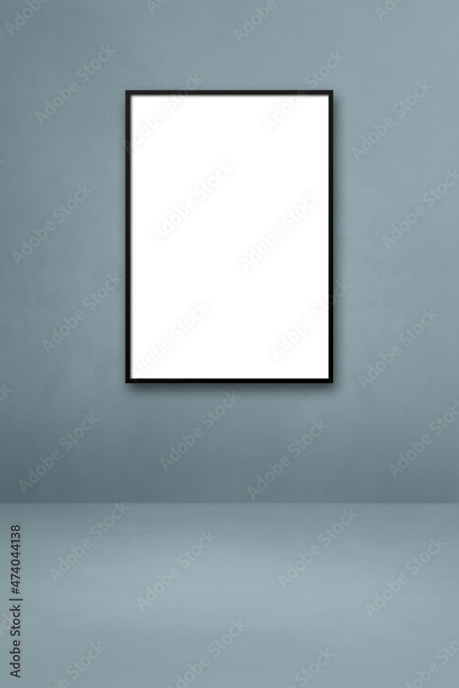 Black picture frame hanging on a grey wall Black picture frame hanging on a grey wall