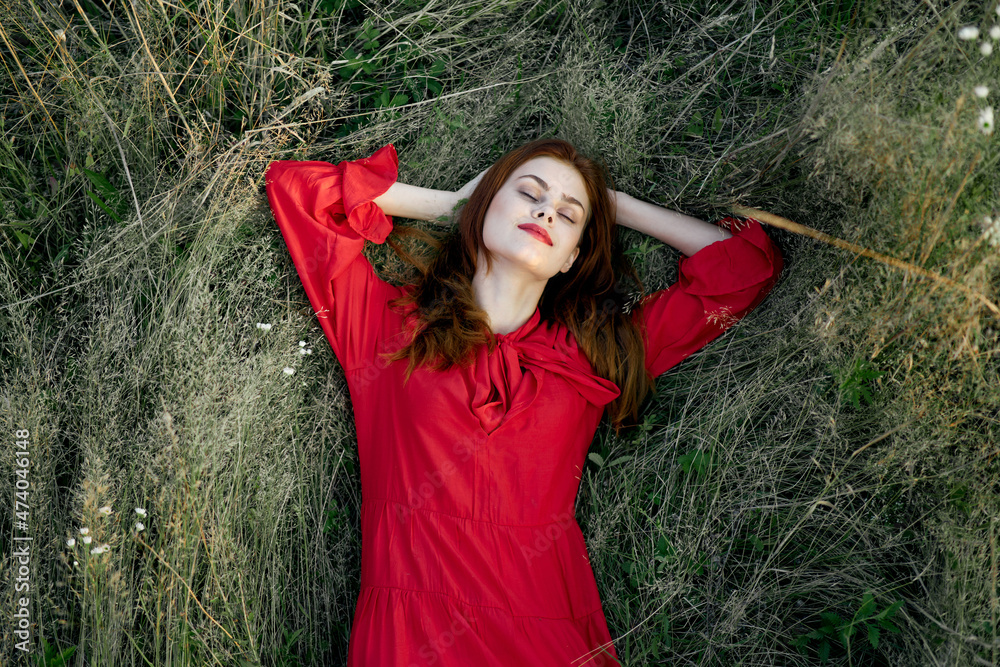 woman in red dress nature green grass landscape rest woman in red dress nature green grass landscape rest