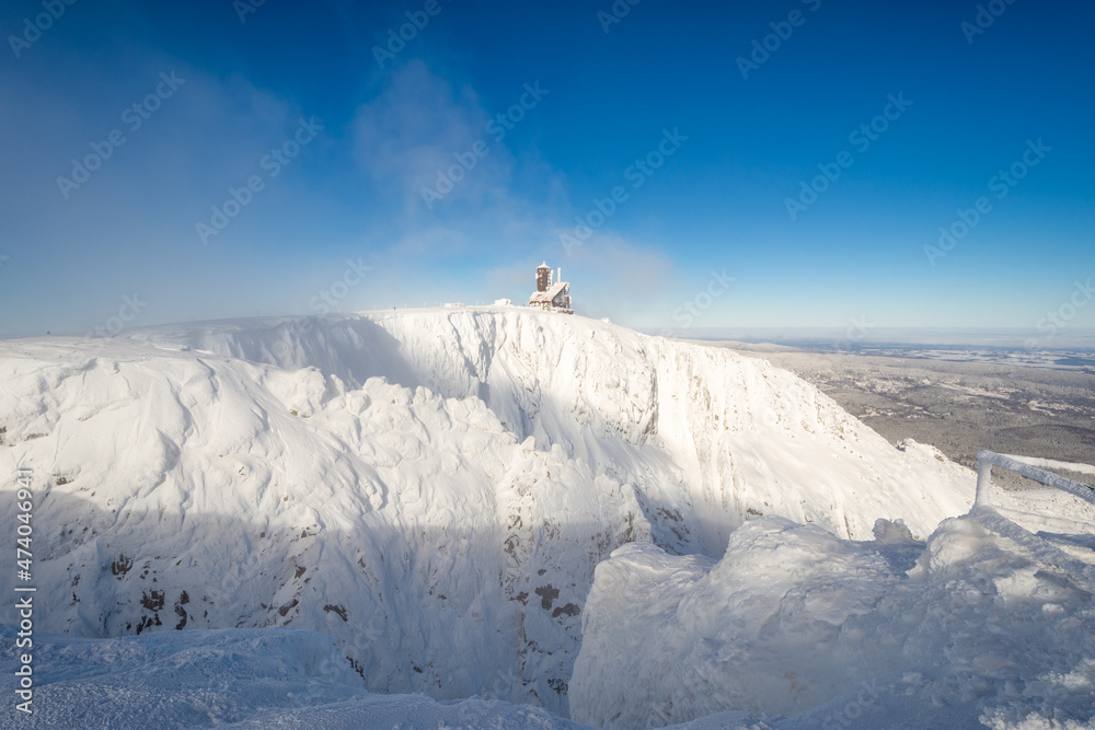 view on famous Sniezne Kotly valley in Karkonosze mountains during winter sunny day in Poland