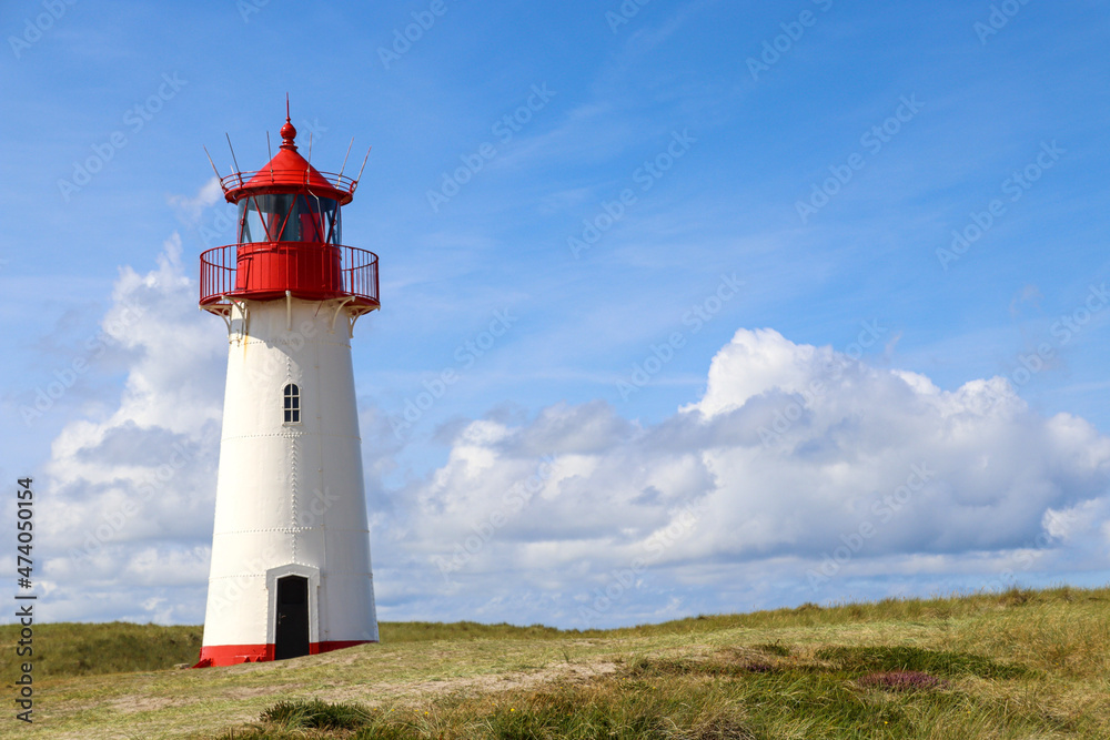 Red and White lighthouse in Sylt Germany Red and White lighthouse in Sylt Germany