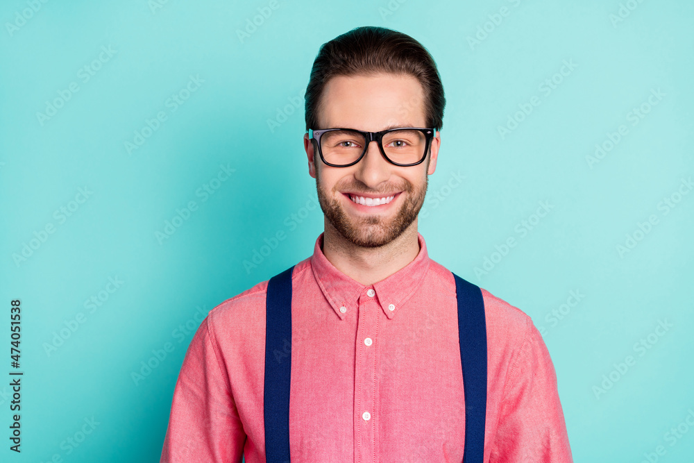 Photo of young cheerful man happy positive smile confident wear eyeglasses isolated over teal color background
