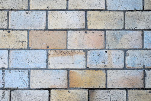 Wall texture. The wall is made of colored bricks.