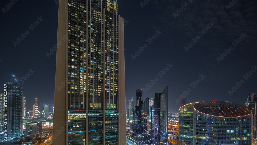 Obraz premium Dubai international financial center skyscrapers aerial night timelapse.