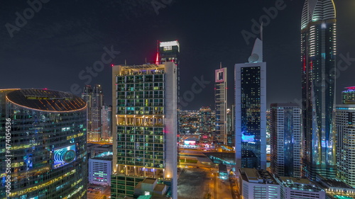Dubai international financial center skyscrapers aerial night timelapse. © neiezhmakov