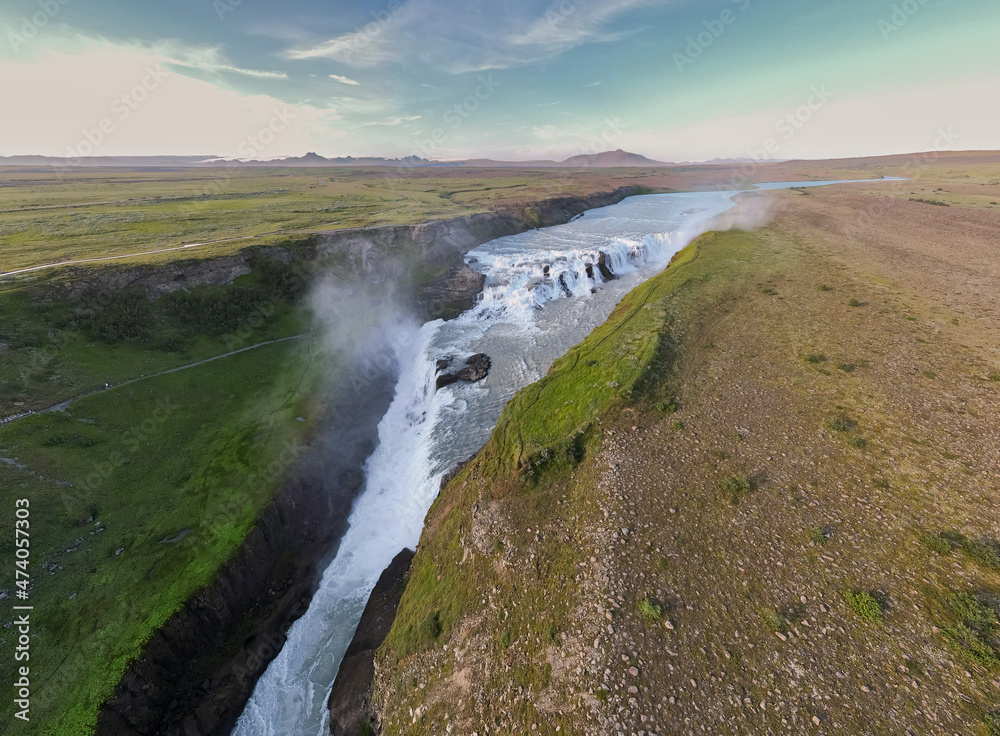 Beautiful aerial view of Iceland Gullfoss waterfall with a rainbow in the Golden Circule Beautiful aerial view of Iceland Gullfoss waterfall with a rainbow in the Golden Circule