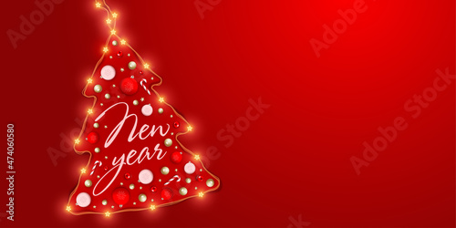 Glowing Christmas tree made of garland with new year decorations