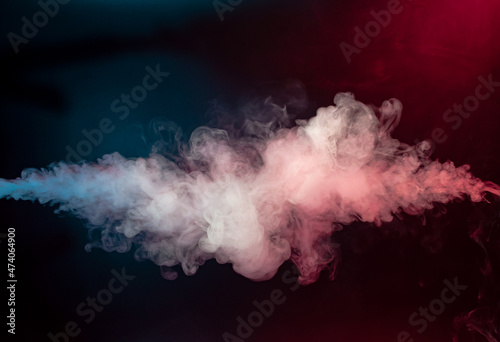 Abstract colorful smoke on black background . © Fedoruk