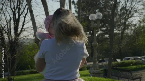 Medium plan mom and daughter play