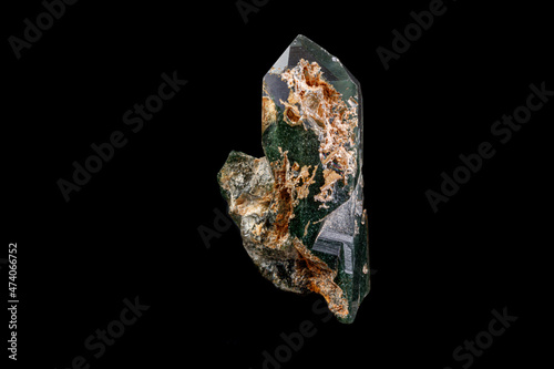 macro Axinite mineral stone on a black background