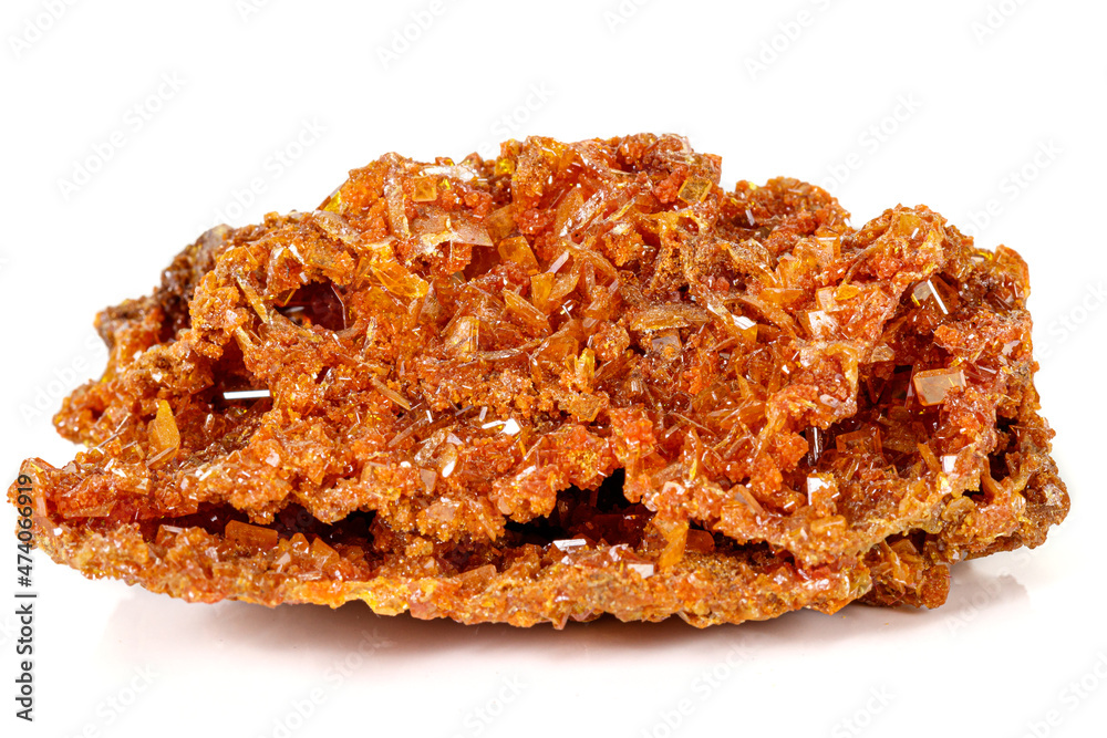 Macro stone mineral Wulfenite on a white background Macro stone mineral Wulfenite on a white background