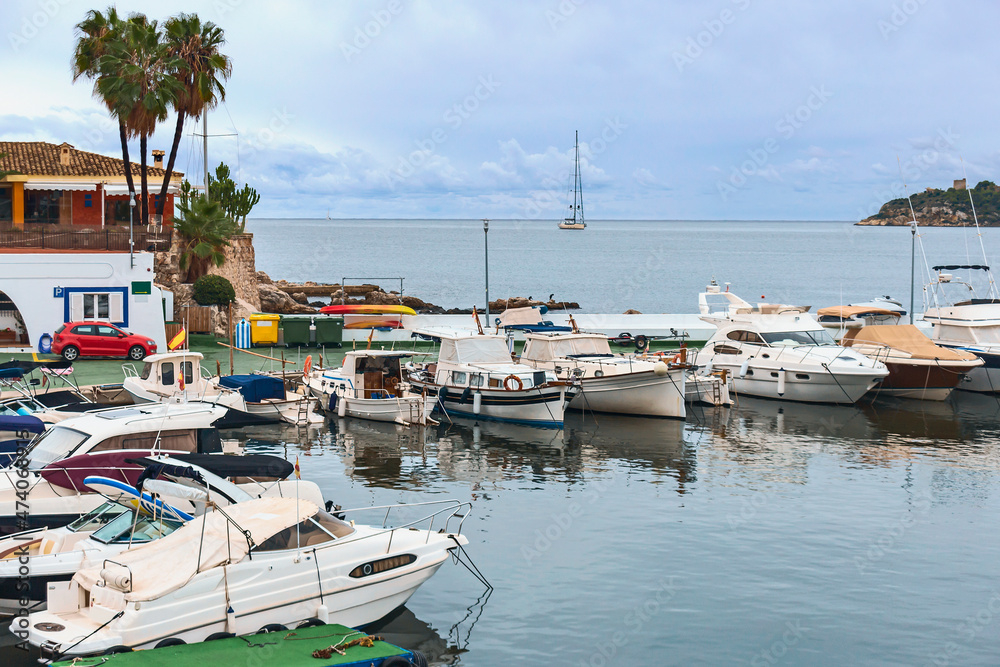 modern motor boats in the quiet harbor of the Spanish city of Palma de Mallorca