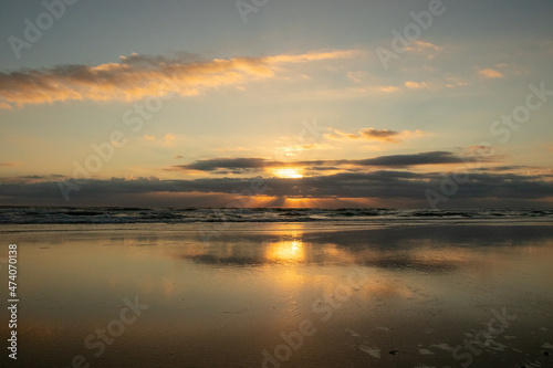 Sunrise across the ocean on a Florida beach. 