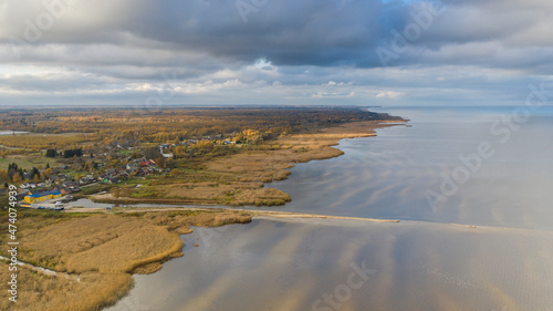 Aerial view to the autumn colored  shallow and sandy  coastal zone of the Lake Peipsi  in Varnja  Estonia. It is the 4th largest lake in Europe