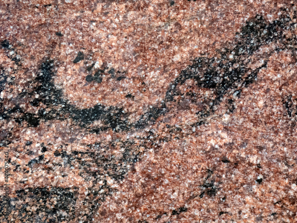 Natural granite stone texture closeup. Can be used as wall or floor for your design works.
