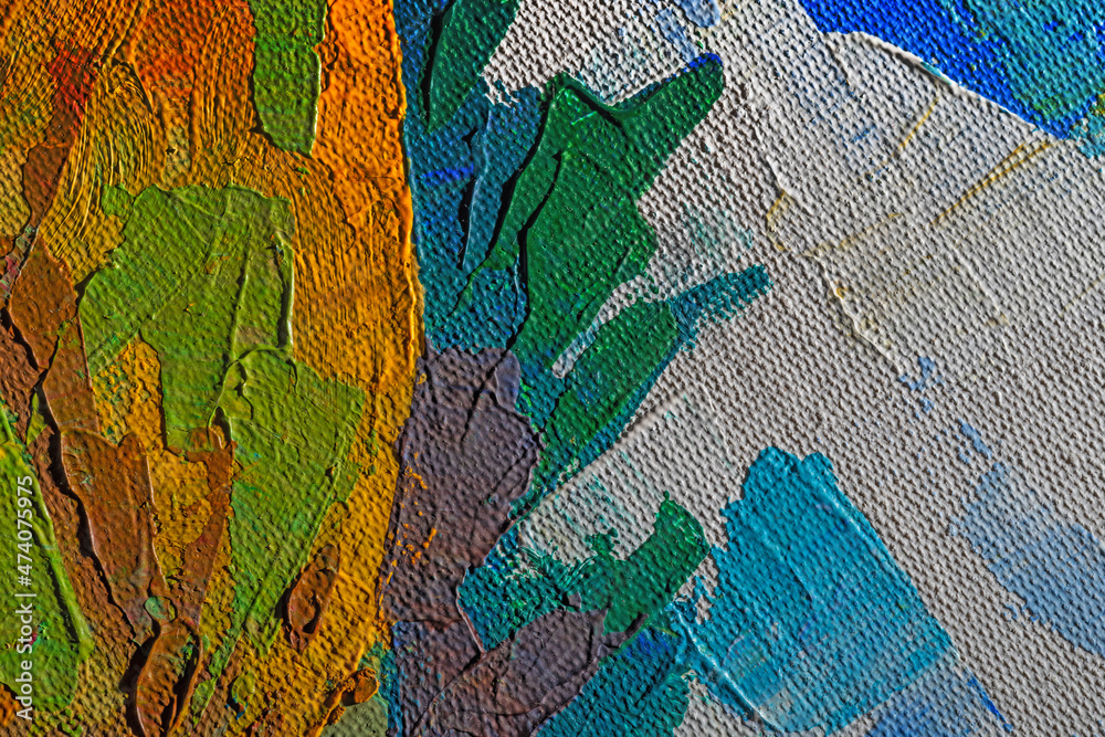 Obraz premium Abstract background closeup of a painting with brushstrokes. Rough art paint smear. Large multicolor spots of brush strokes and palette knife on the canvas