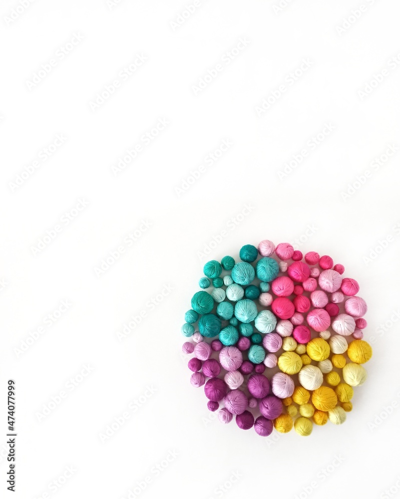 White background. Colored thread, balls of yarn. White background. Colored thread, balls of yarn.