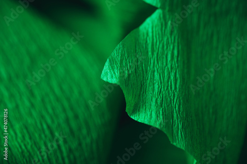 Fragment of a green crepe paper. Macro photography