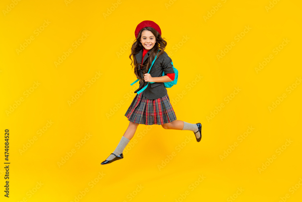 happy childhood. child with school bag. happy teen girl in beret carry backpack. back to school