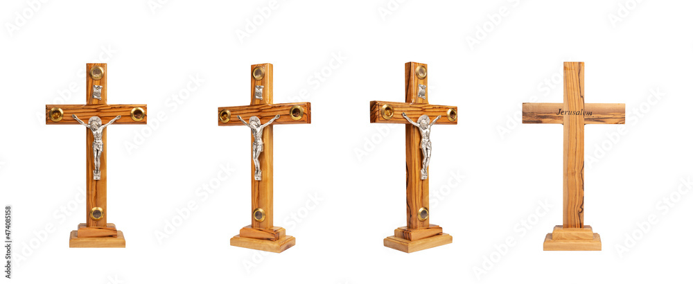  Set of  Wooden crucifix standing on white background.