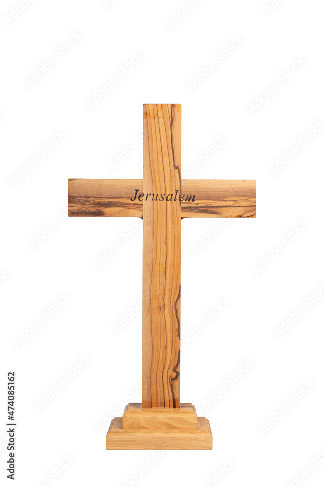 Wooden crucifix standing  back side on white background.