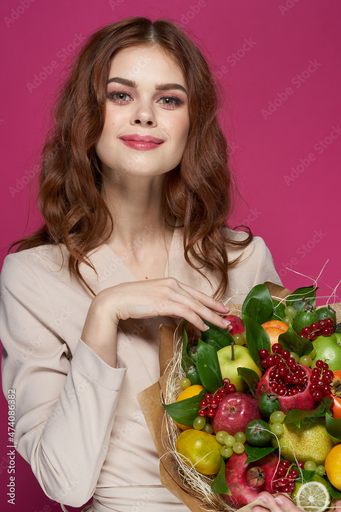 portrait of a woman smile posing fresh fruits bouquet emotions Studio Model portrait of a woman smile posing fresh fruits bouquet emotions Studio Model