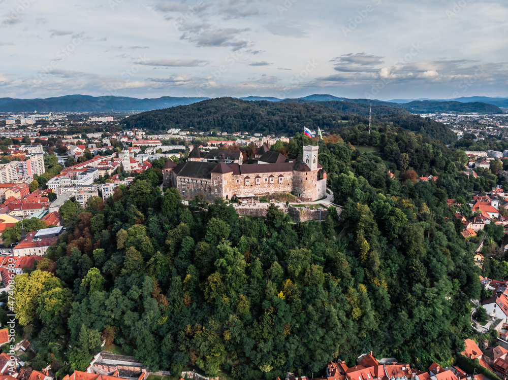 A shot from a drone Ljubljana castle. View from a drone of a medieval fortress on a hill, Castle above the city of Ljubljana. Ljubljana drone shot. Defensive fortification in Slovenia.