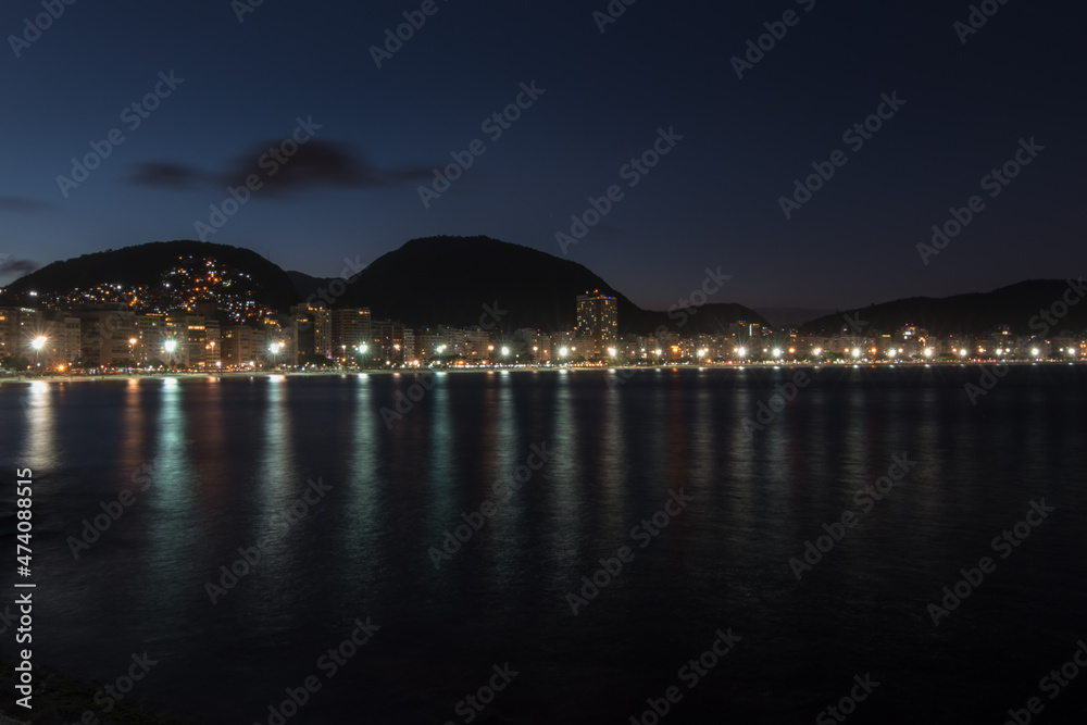 Beautiful night view of Copacabana coastline from Copacabana Fortress (Forte de Copacabana) - Rio de Janeiro, Brazil