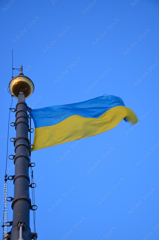 Ukrainian flag on the building of the town hall in Lviv.