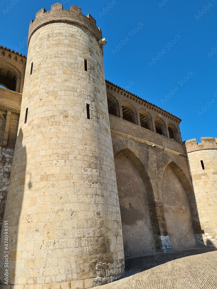 large historic palace aljafería in saragossa spain on a warm sunny day