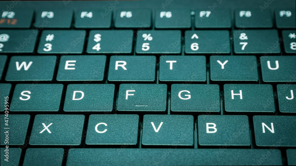 Computer keyboard close up on black background Computer keyboard close up on black background